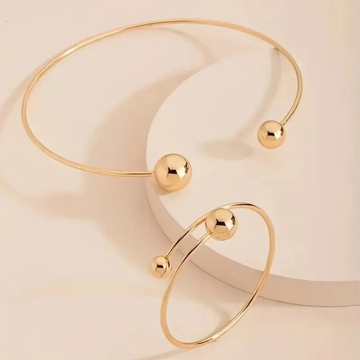 Minimalistyczny zestaw Glow: naszyjnik typu collar i bransoletka cuff | Złoto