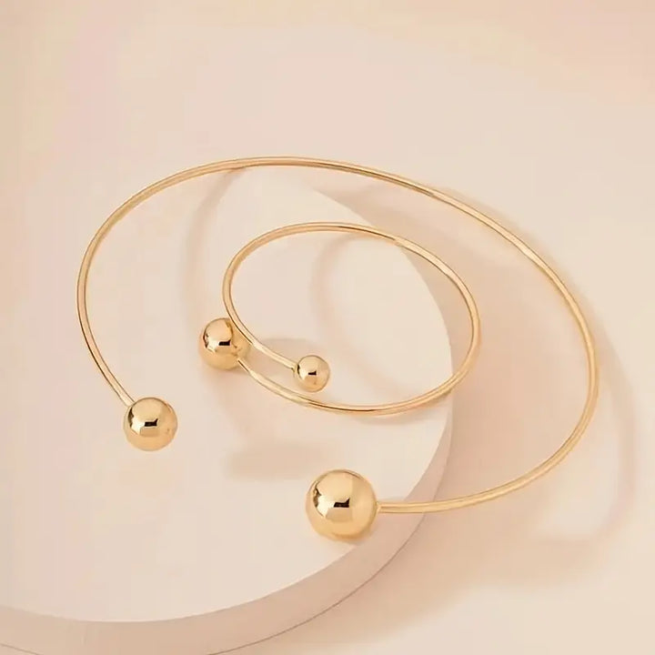 Minimalistyczny zestaw Glow: naszyjnik typu collar i bransoletka cuff | Złoto