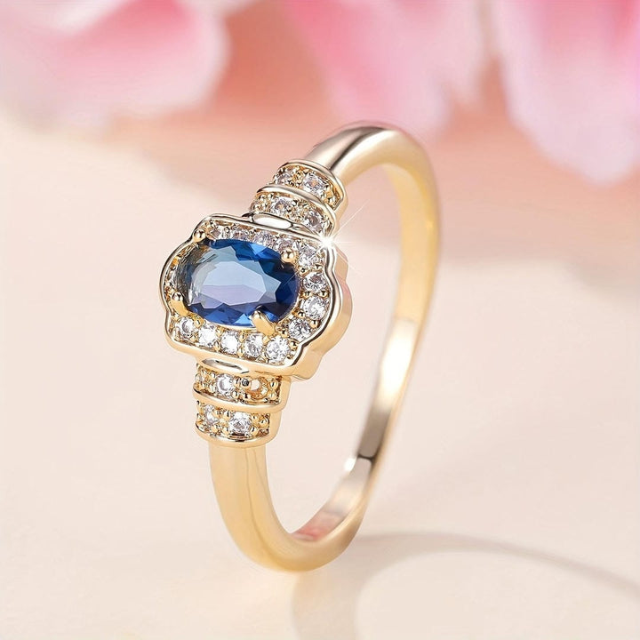 Pierścionek Heirloom Halo z szafirem i kryształkami