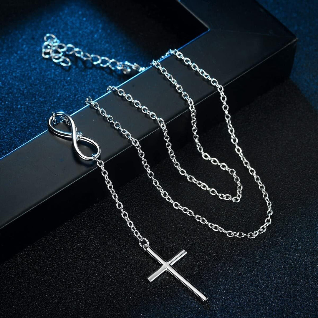 Elegancki wydłużony wisiorek w kształcie krzyża nieskończoności