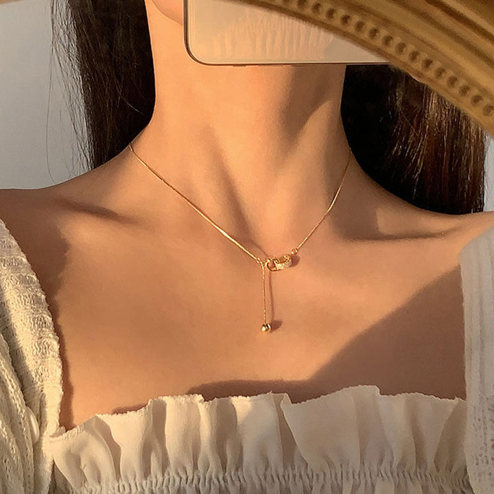 Janna Złoty naszyjnik z elegancką frędzlą