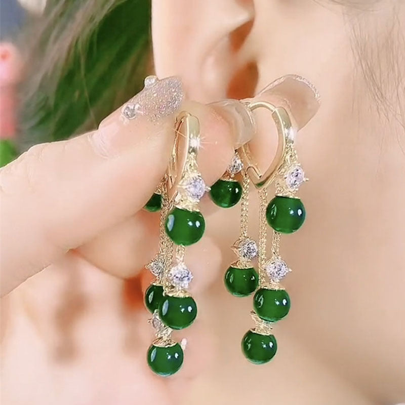Evergreen pozłacane kolczyki z chwostami – ponadczasowa biżuteria wisząca