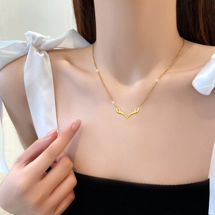 Lana Gold Naszyjnik z poroża jelenia - Elegancka biżuteria z wisiorkiem w odcieniu złota