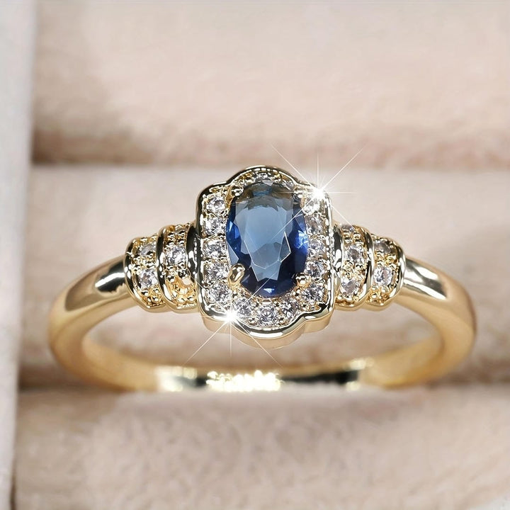 Pierścionek Heirloom Halo z szafirem i kryształkami